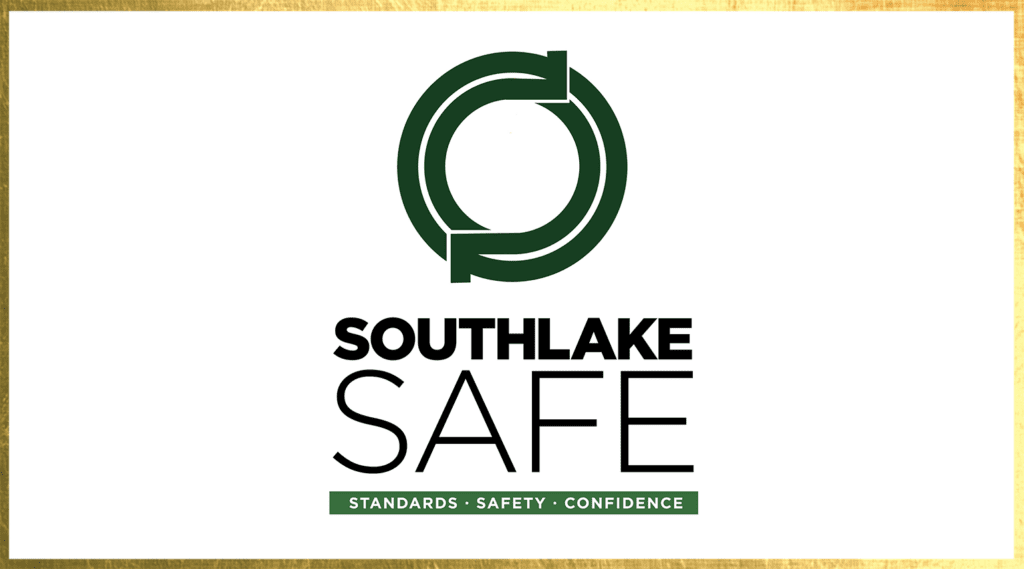 Logo with a circular design and the words "Southlake Safe" in bold black letters. Below, it reads "Standards - Safety - Confidence" in smaller text. The border is a gold frame on a white background.