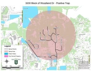 Map showing the 3200 Block of Woodland Dr with spray area highlighted in red. Includes streets, public parks, and city-owned property in Southlake. Legend shows spray and public areas. Surrounding neighborhoods visible.