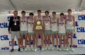 A Country Team posing with a trophy