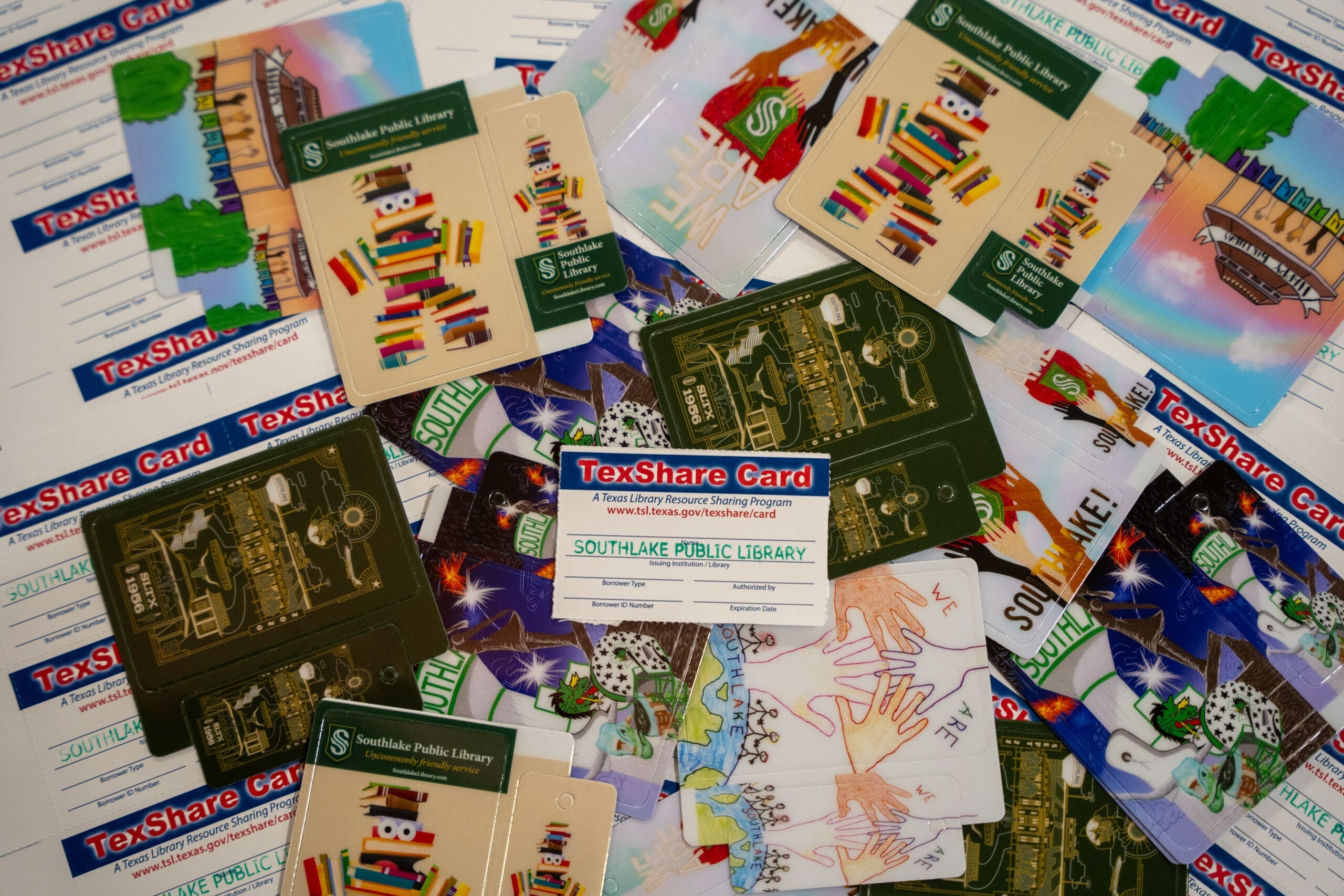 A collage of Texshare cards surrounded by Southlake Library cards.
