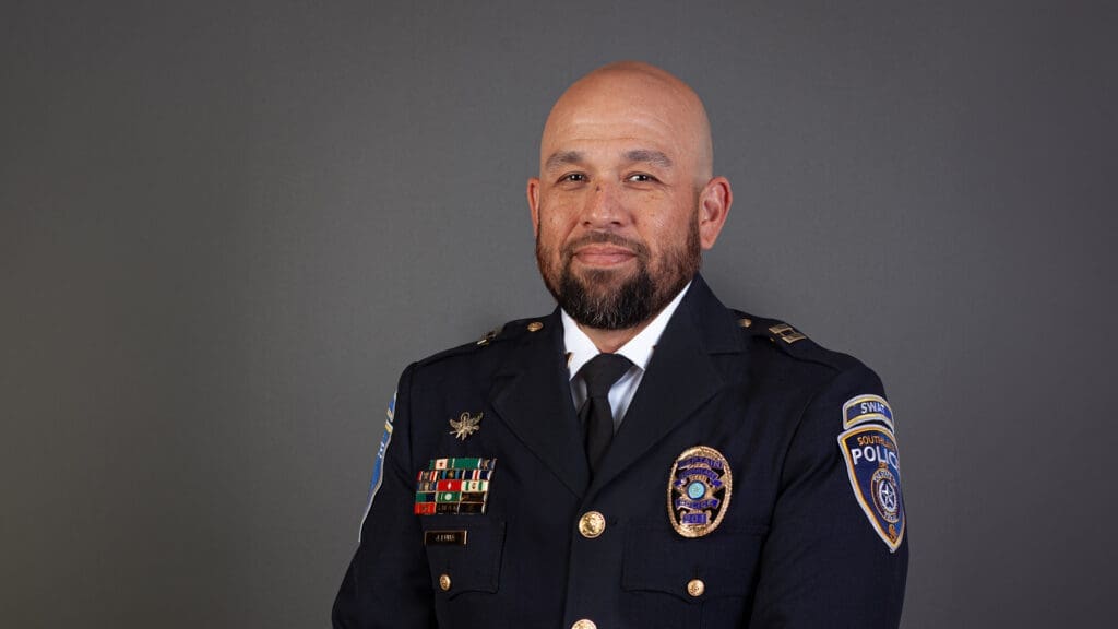 Photo of a police officer posing for a photo