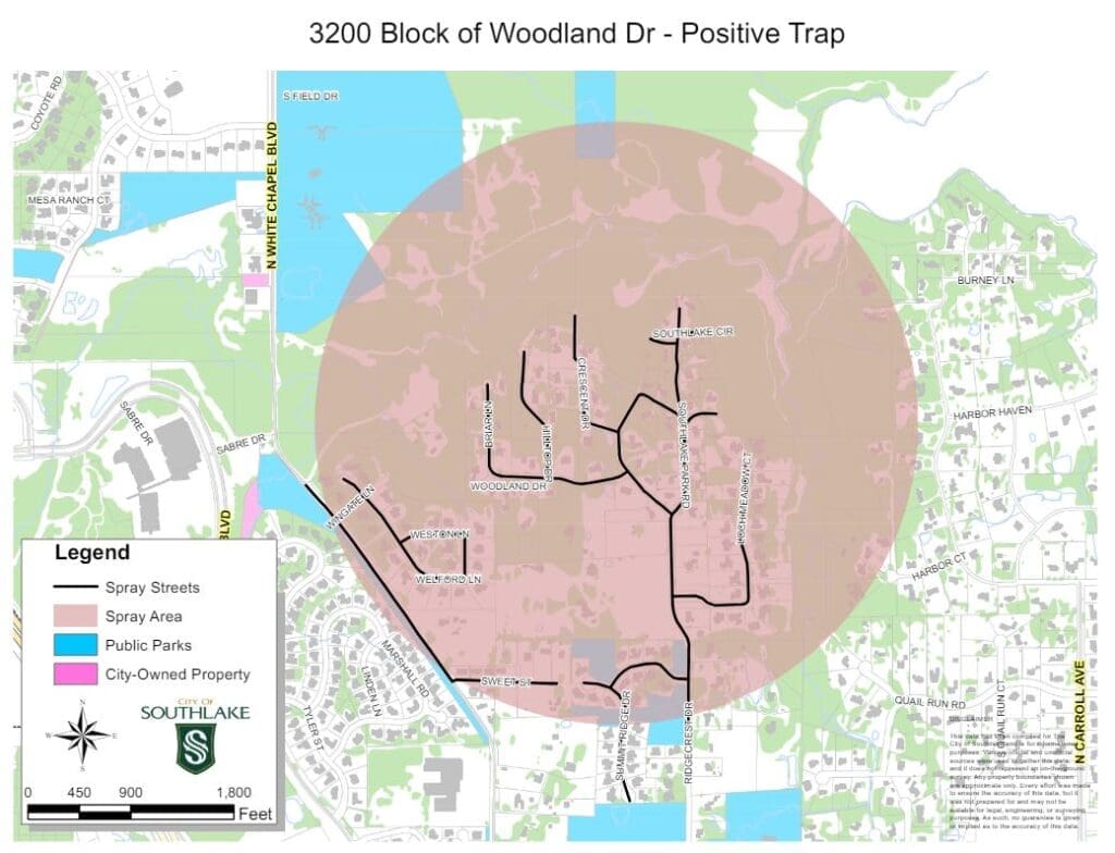 Map titled "3200 Block of Woodland Dr - Positive Trap" showing spray areas, streets, public parks, and city-owned properties. A large circular shaded area indicates a spray zone. A legend at the bottom left identifies map symbols.