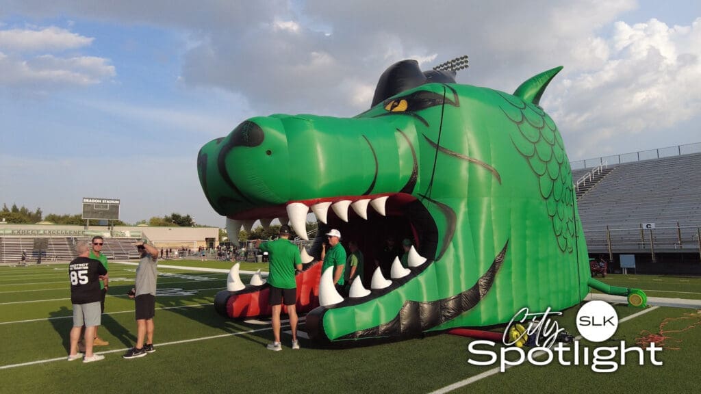 Image of Inflatable Dragon Mascot on Football Field