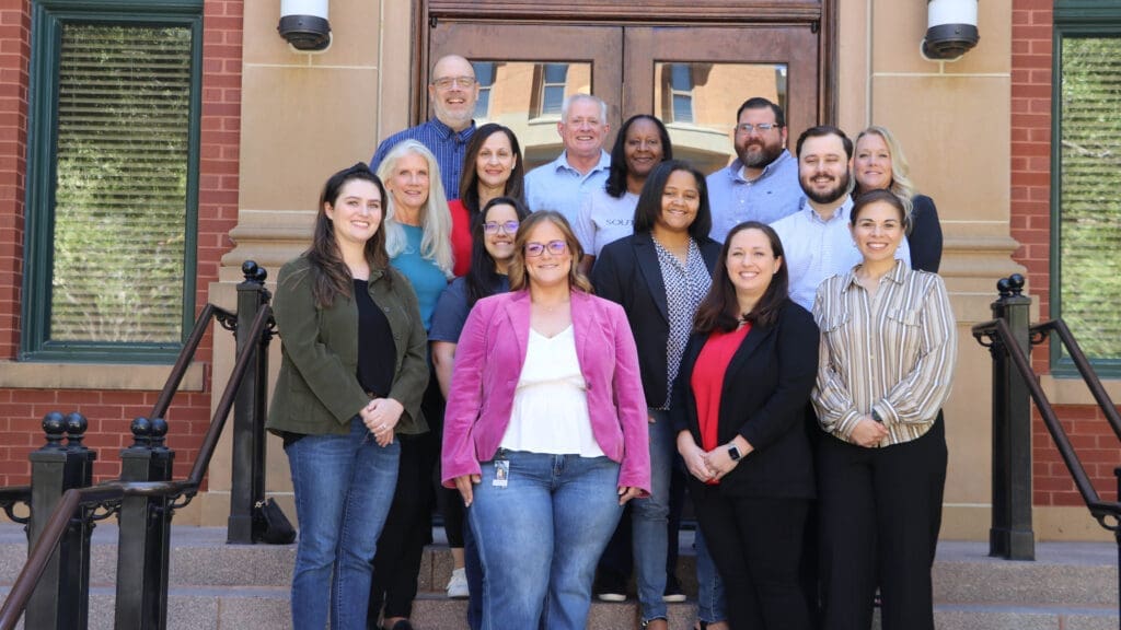 Photo of employees smiling