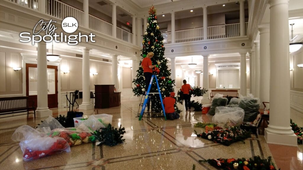Image of the Town Hall Christmas tree being decorated.
