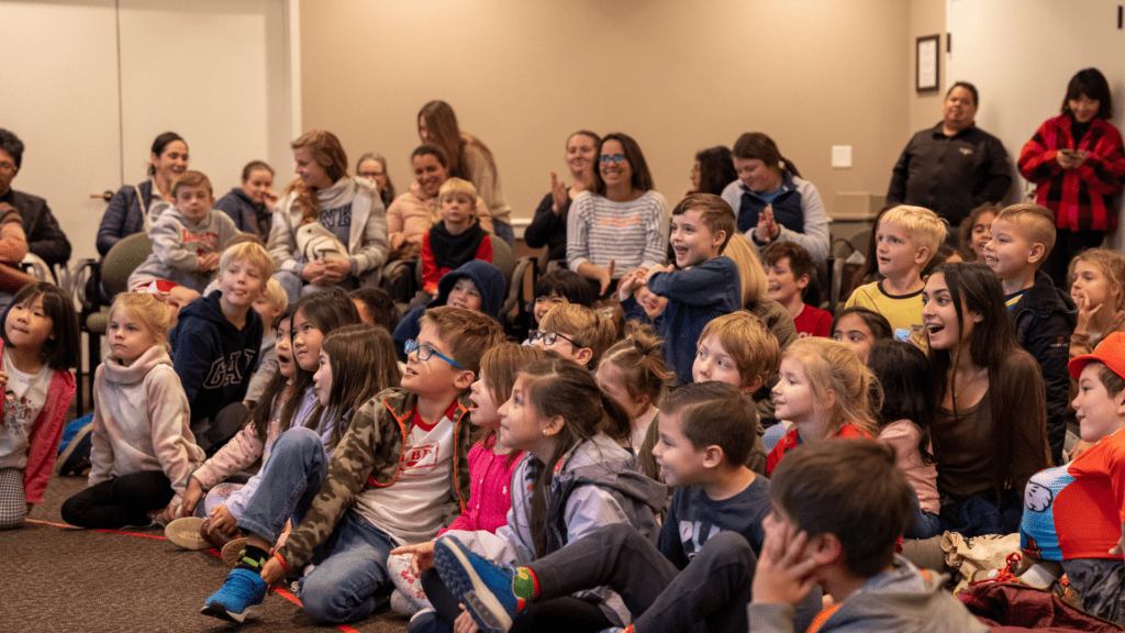 Kids at a Southlake Library program smiling.