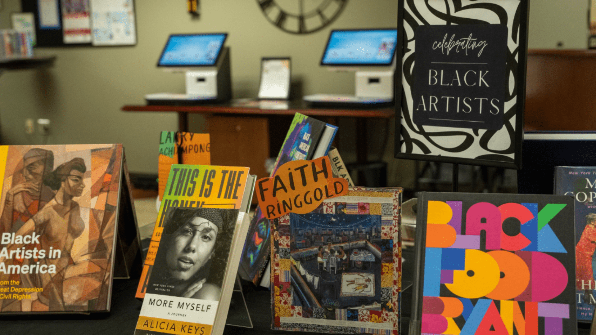 The image showcases a curated selection of books at the Southlake Library, celebrating Black History Month.