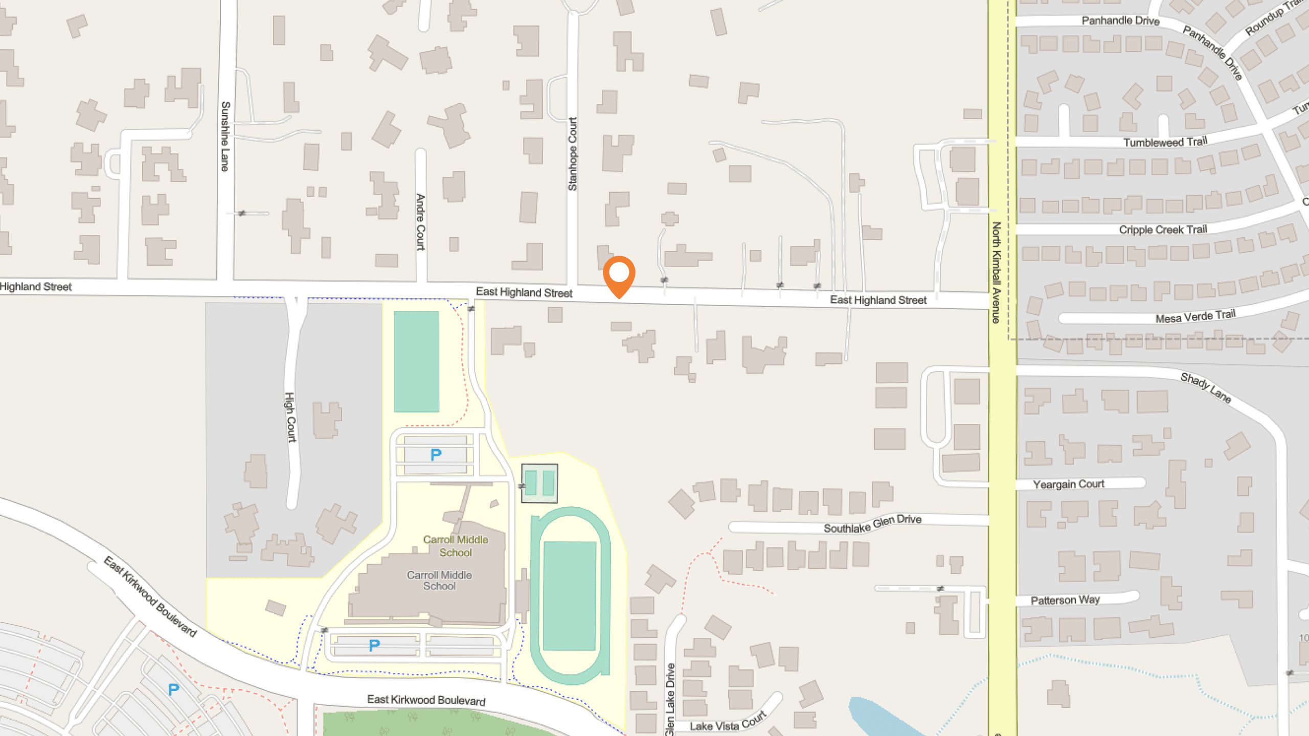 Map showing East Highland Street intersecting with several small roads. A location pin marks a spot slightly north of East Highland Street, near residential areas and a large school complex to the southwest.