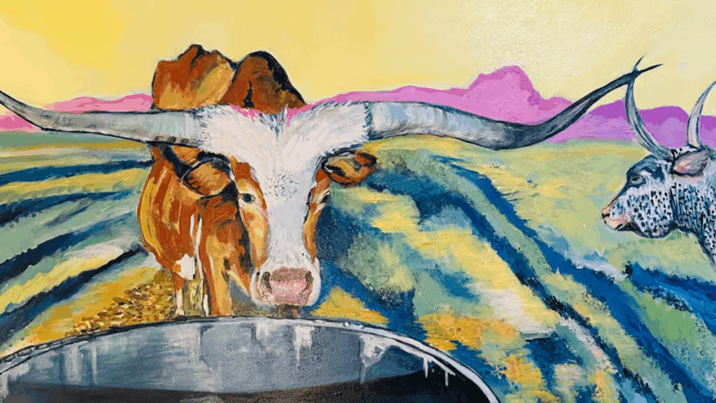 A colorful painting of a longhorn cow with wide, curved horns standing near a water trough in a vibrant field, with another cow and purple mountains in the background under a yellow sky.