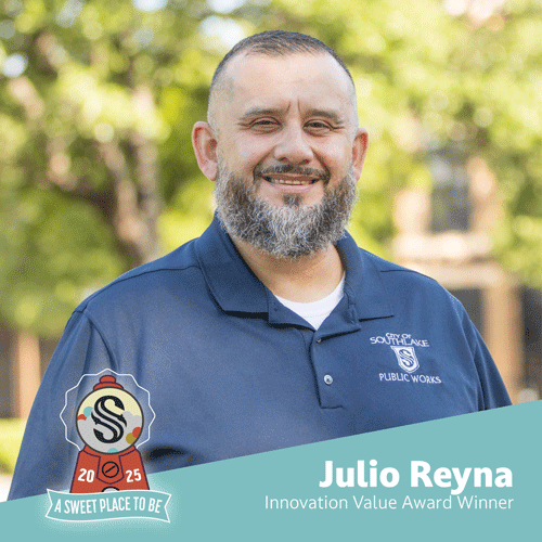 A man with a beard, wearing a navy blue Southlake Public Works polo, smiles outdoors. Text reads: "Julio Reyna, Innovation Value Award Winner" with a "A Sweet Place To Be 2025" badge in the corner.