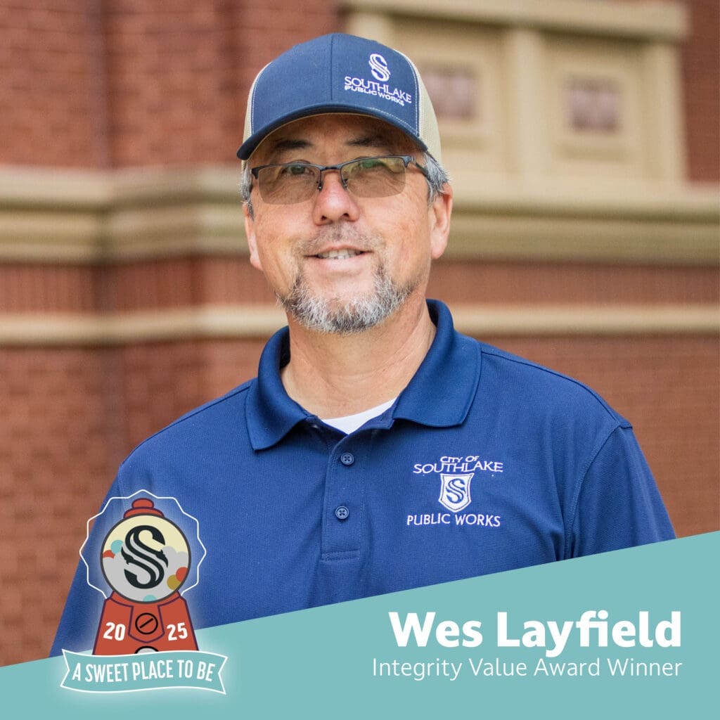 A man wearing glasses, a blue cap, and a blue "Southlake Public Works" polo shirt smiles outdoors. Text reads: "Wes Layfield, Integrity Value Award Winner, 2025, A Sweet Place to Be.
