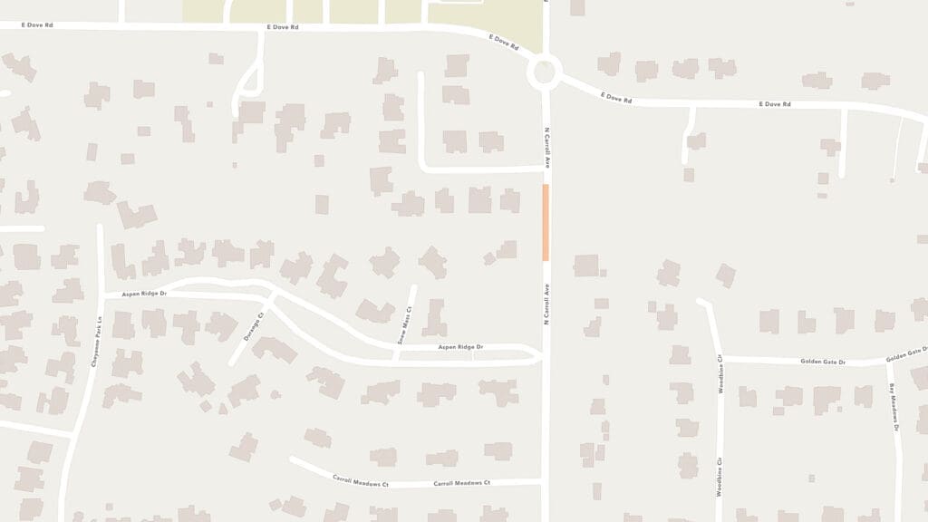 A map of a suburban neighborhood with several curved and straight streets, houses marked as rectangles, and a highlighted section of E. Castle Pines Pkwy near a T-intersection. Streets and homes are shown in light colors.