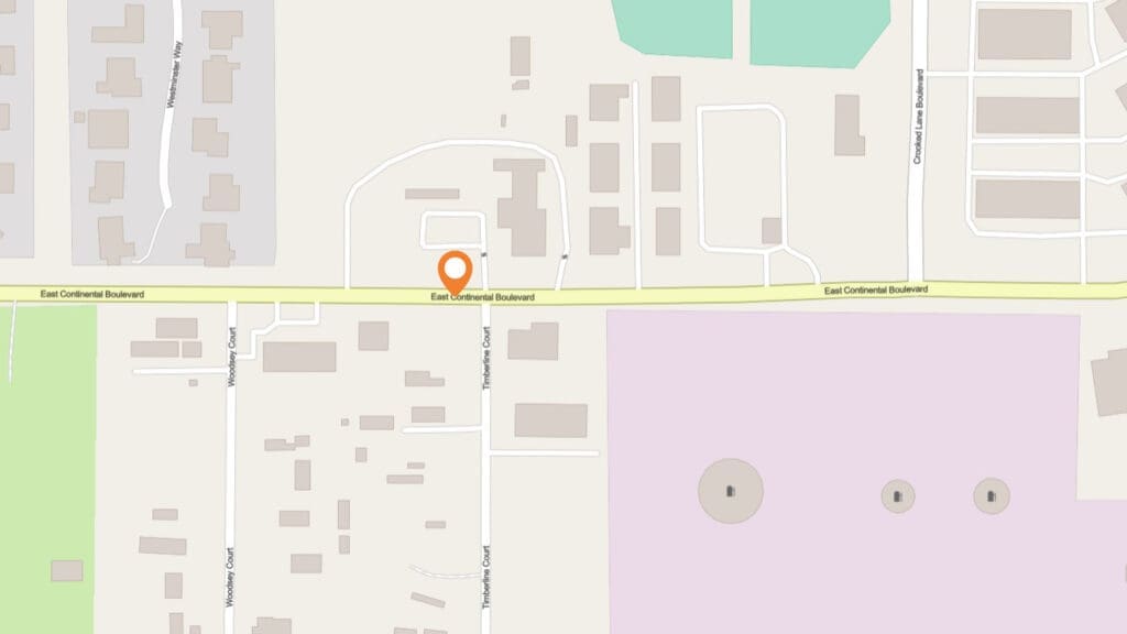 A map shows a highlighted location marked with an orange pin along East Continental Boulevard, surrounded by buildings, roads, and a large purple area to the south.