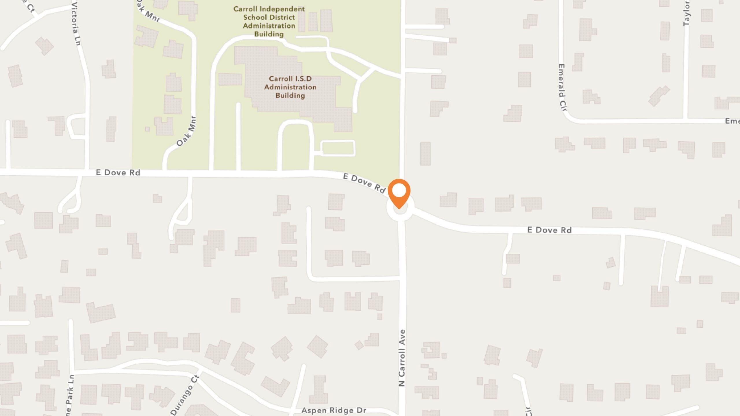 Map showing the intersection of E Dove Rd and N Carroll Ave near Carroll ISD Administration Building, marked by an orange location pin, surrounded by residential streets and buildings.
