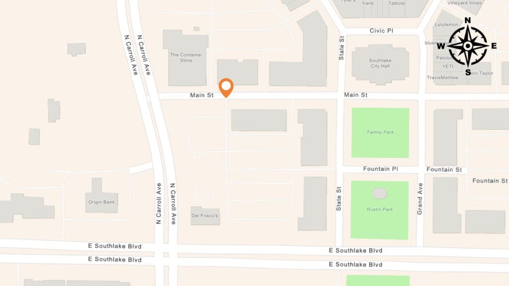 A map highlighting Main St. near N Carroll Ave and E Southlake Blvd, with a location pin on Main St. Parks and several buildings are visible nearby, along with a compass rose in the top right corner.