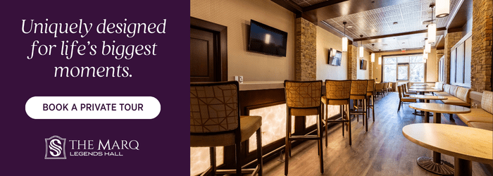 A stylish, modern event space with tall chairs, round tables, and large windows. Purple text reads, "Uniquely designed for life’s biggest moments." Button: "Book a private tour." Logo: The Marq Legends Hall.