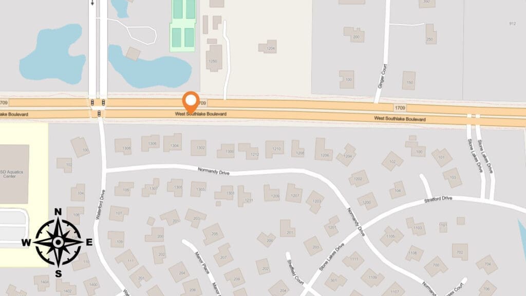 A map showing West Sunblabe Boulevard with an orange location marker near a pond, surrounded by residential streets and houses. A compass rose is in the lower left corner indicating north, south, east, and west.